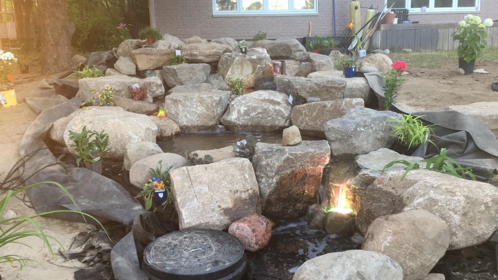 Backyard stormwater storage and landscape feature integrating modular crates in Canada