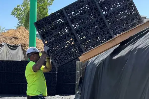 Large scale underground stormwater detention basin installation for commercial site