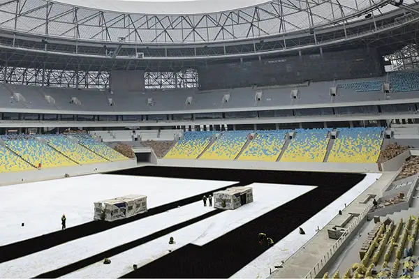 Subsurface irrigation and drainage system beneath sports turf using attenuation crates